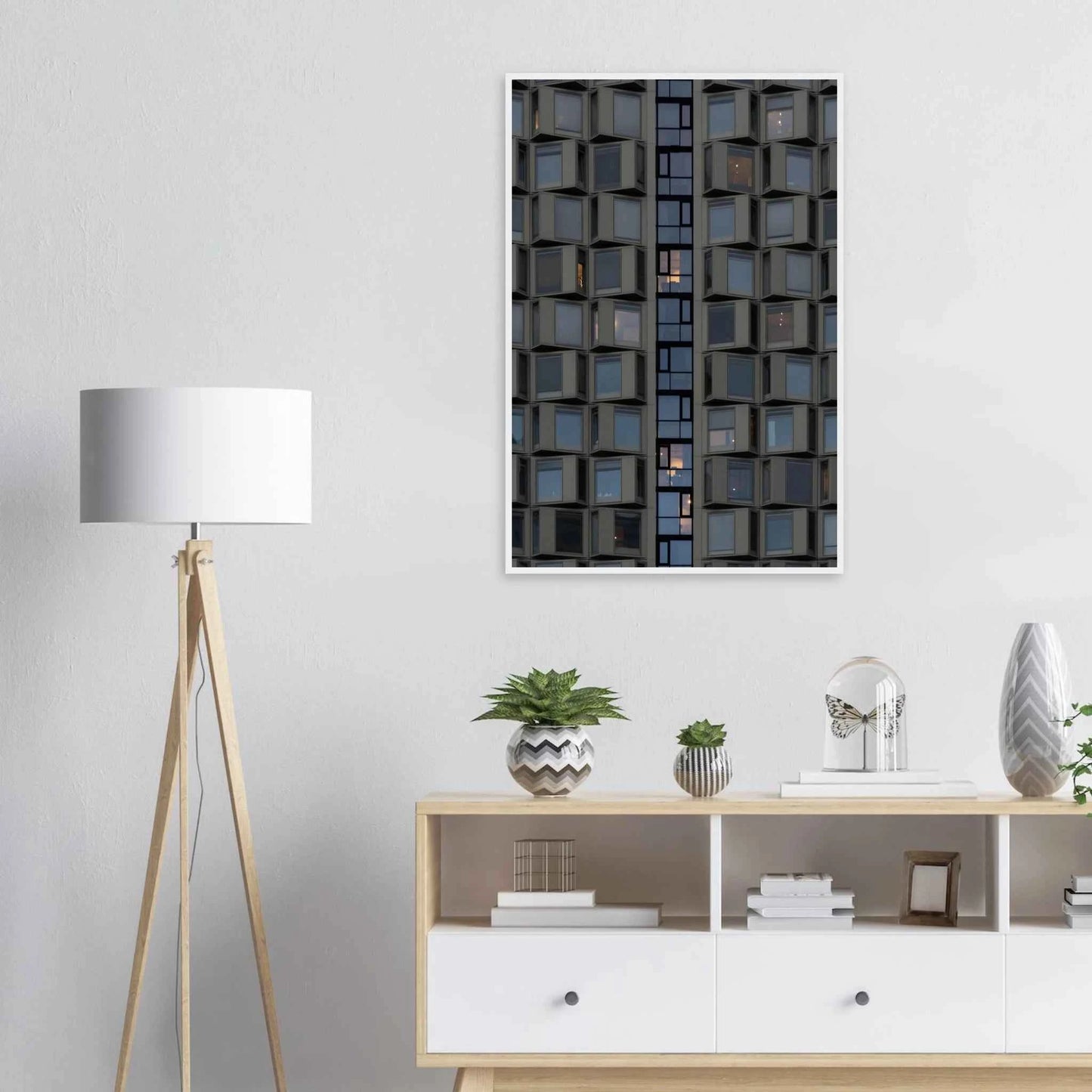Close up view of a modern building facade with a grid of reflective glass windows on wooden frame wall art on the wall in the Livingroom