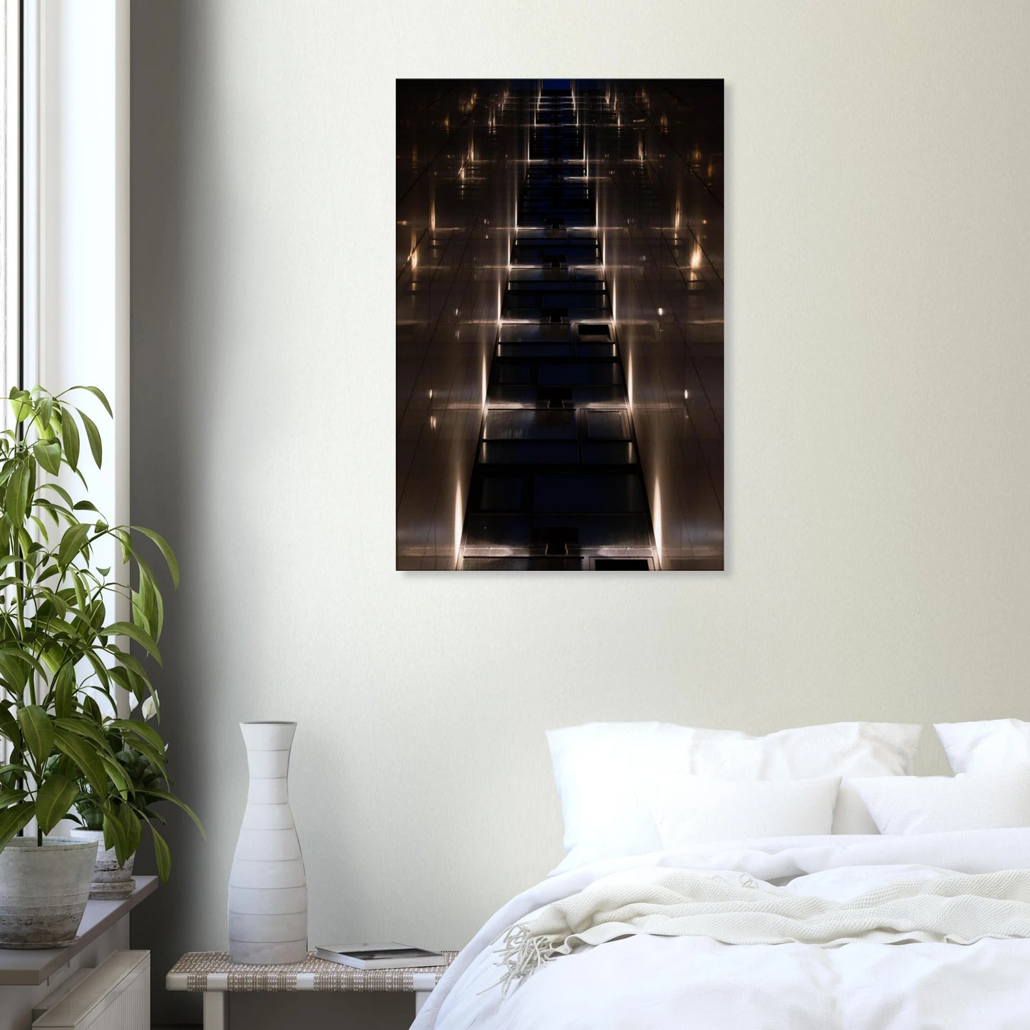 Low angle view looking up a narrow corridor-like passage between two skyscraper walls lined with rows of windows stretching toward the sky on Canvas print wall art on the wall in the Bedroom