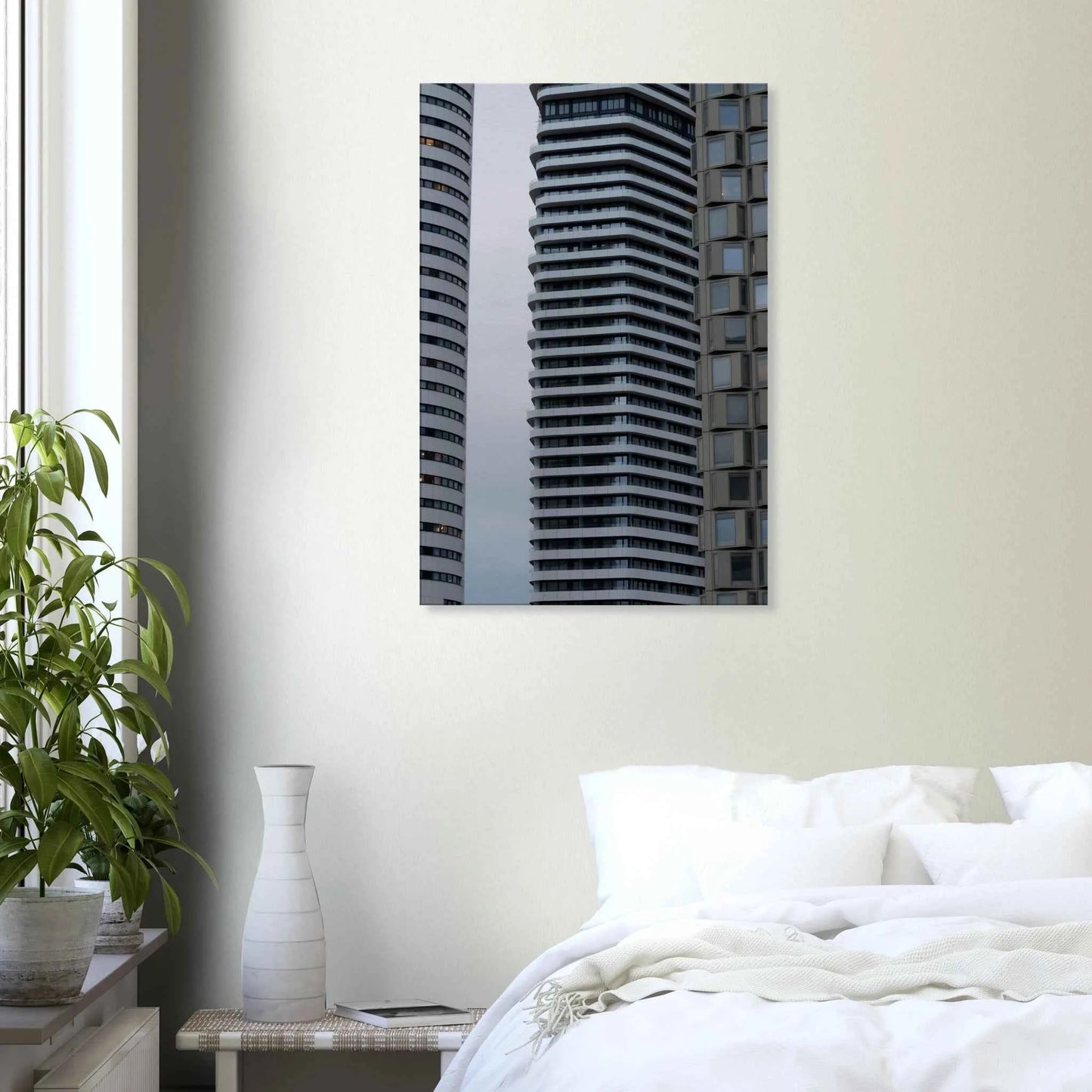 Modern high rise tower buildings with glass and steel facade reaching into the sky on Canvas Print wall art on the wall in the Bedroom