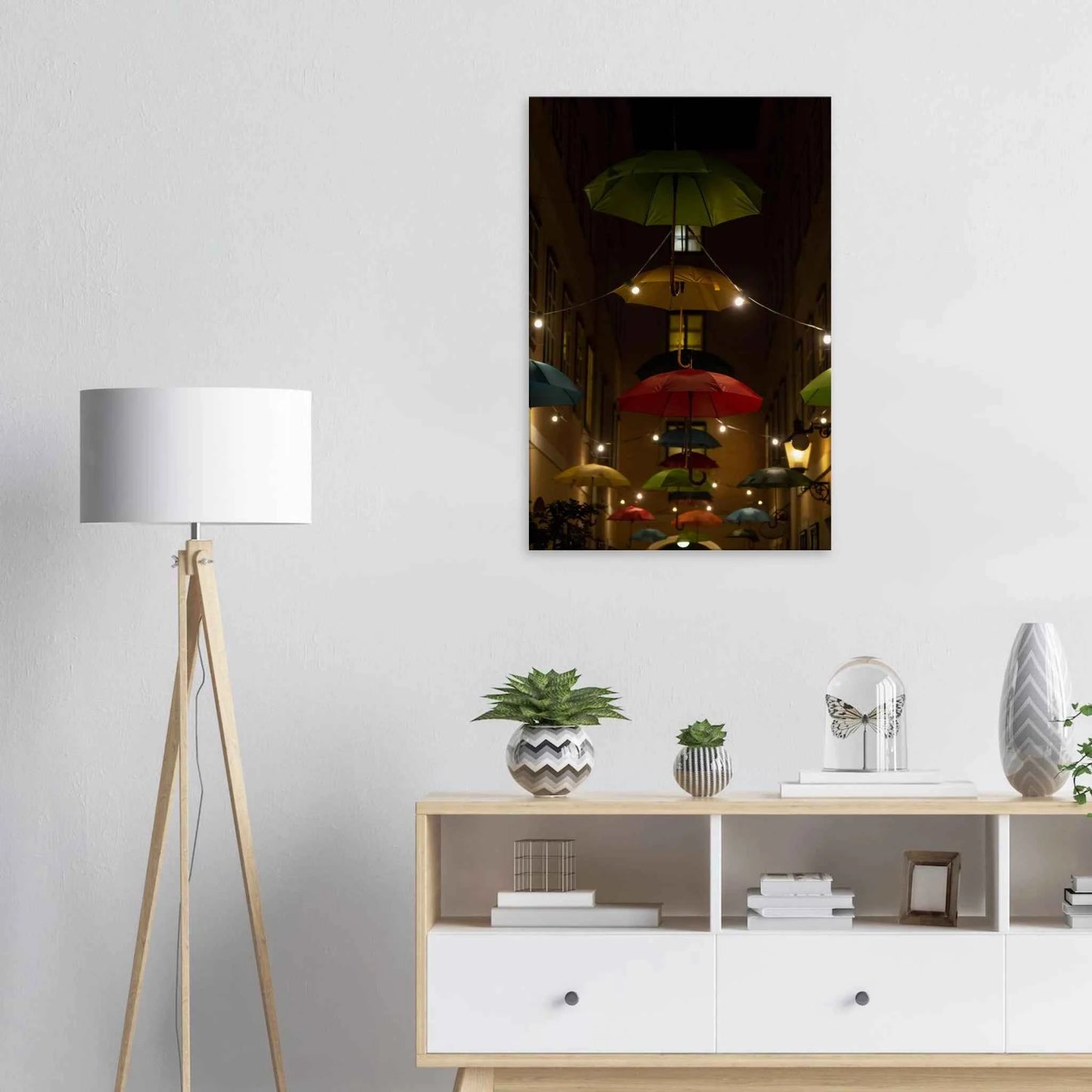 Nighttime street scene with colorful illuminated umbrellas hanging as decoration above a vibrant outdoor area on a wooden frame wall art on the wall in the Livingroom