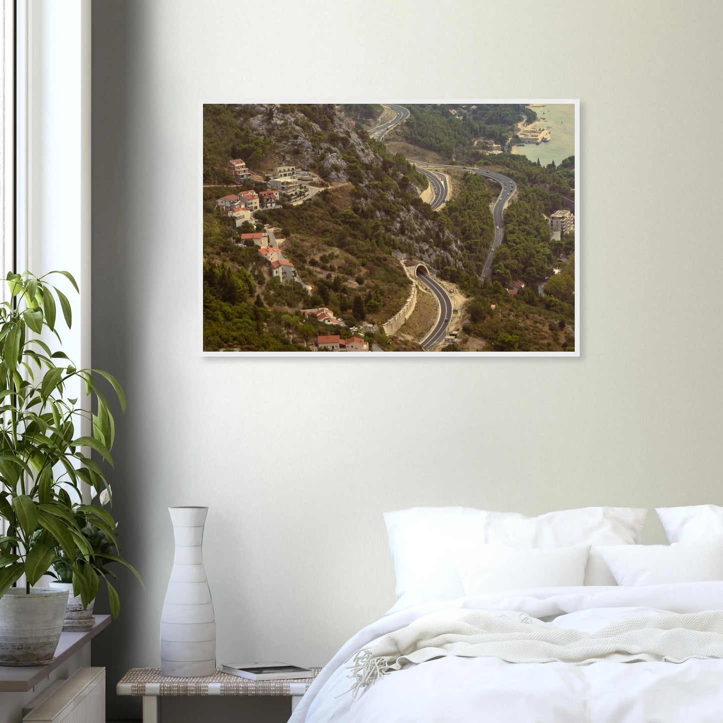 Classic, retro oil painting of a detailed landscape scene with lush trees, figures and rich natural surroundings on wooden framed wall art on the wall in the Bedroom