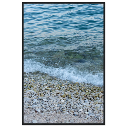 Aerial view ocean beach with wood frame, top down drone shot of blue sea foam and pebbles
