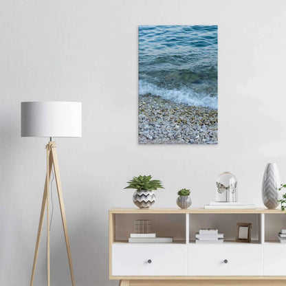 Aerial view ocean beach with wood frame canvas print, top down drone shot of blue sea foam and pebbles on the wall in the Livingroom