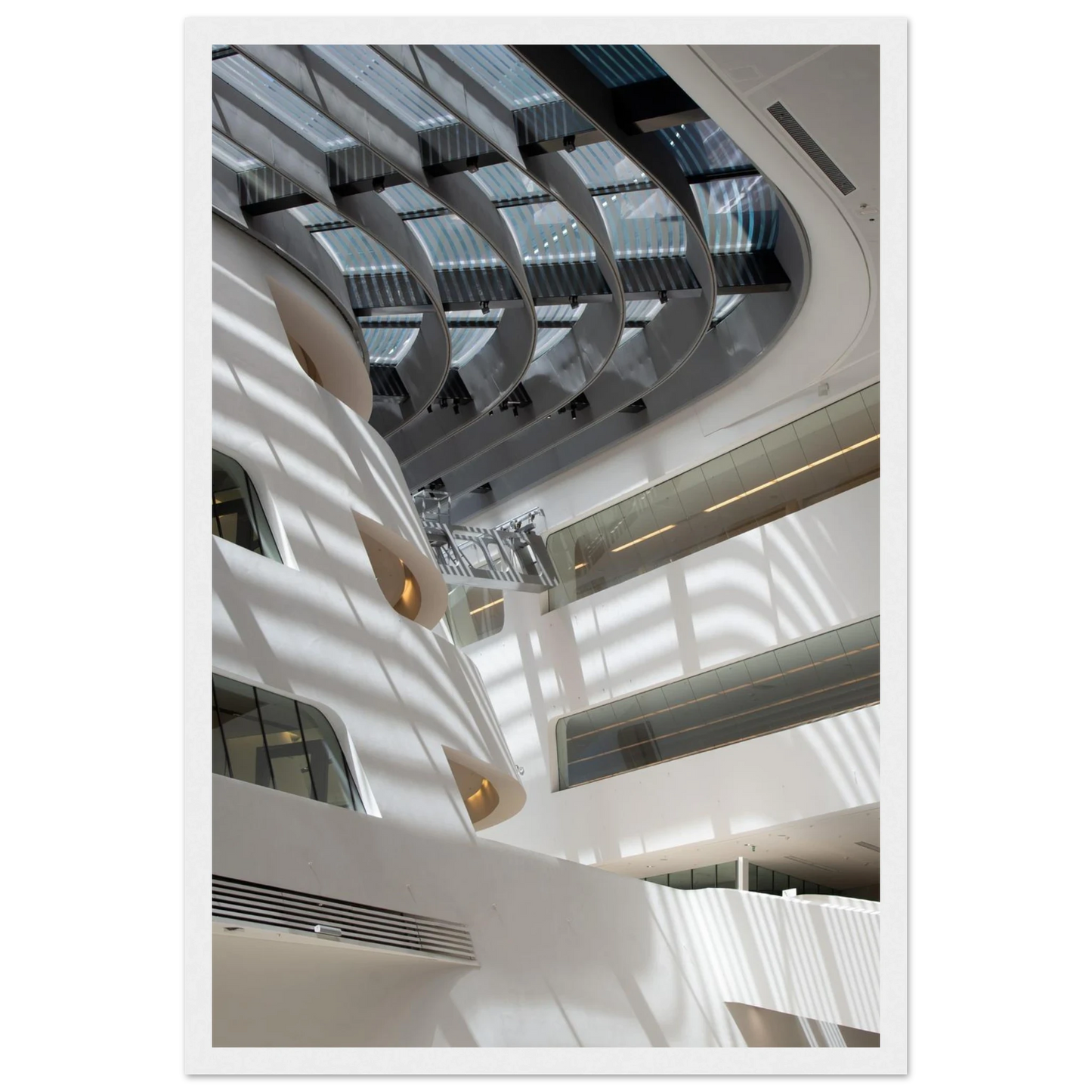 Interior view of the Library of WU (Vienna University of Economics and Business) on wooden frame wall art featuring modern architecture with multiple floors and open study spaces