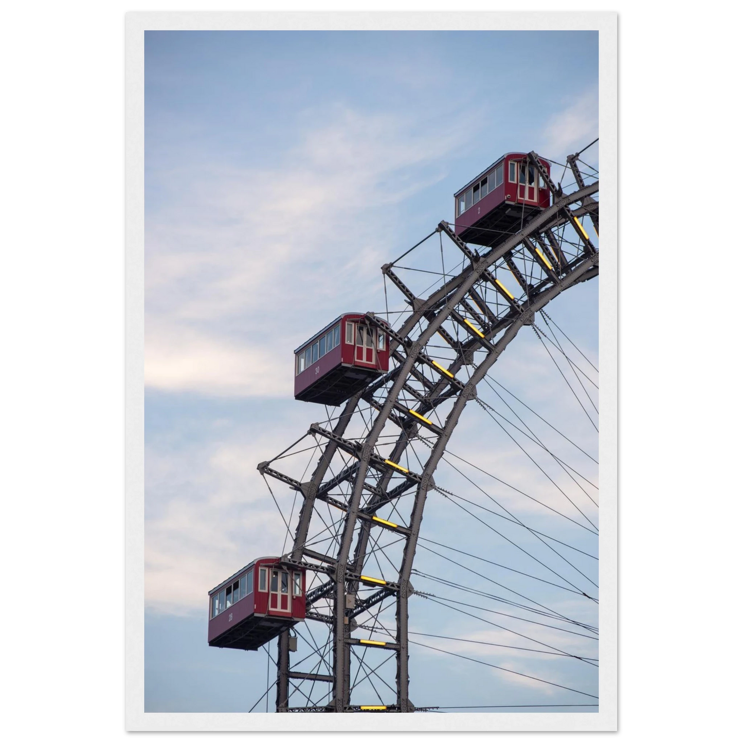 Close up of the historic Vienna Prater Giant Ferris Wheel (Wiener Riesenrad) showing its iconic steel structure and vintage mechanical details on wooden framed wall art