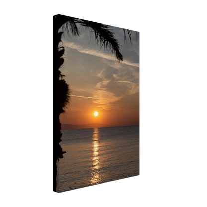Canvas print wall art, Sunset over calm water with golden reflections, framed by tree branches in a peaceful natural landscape