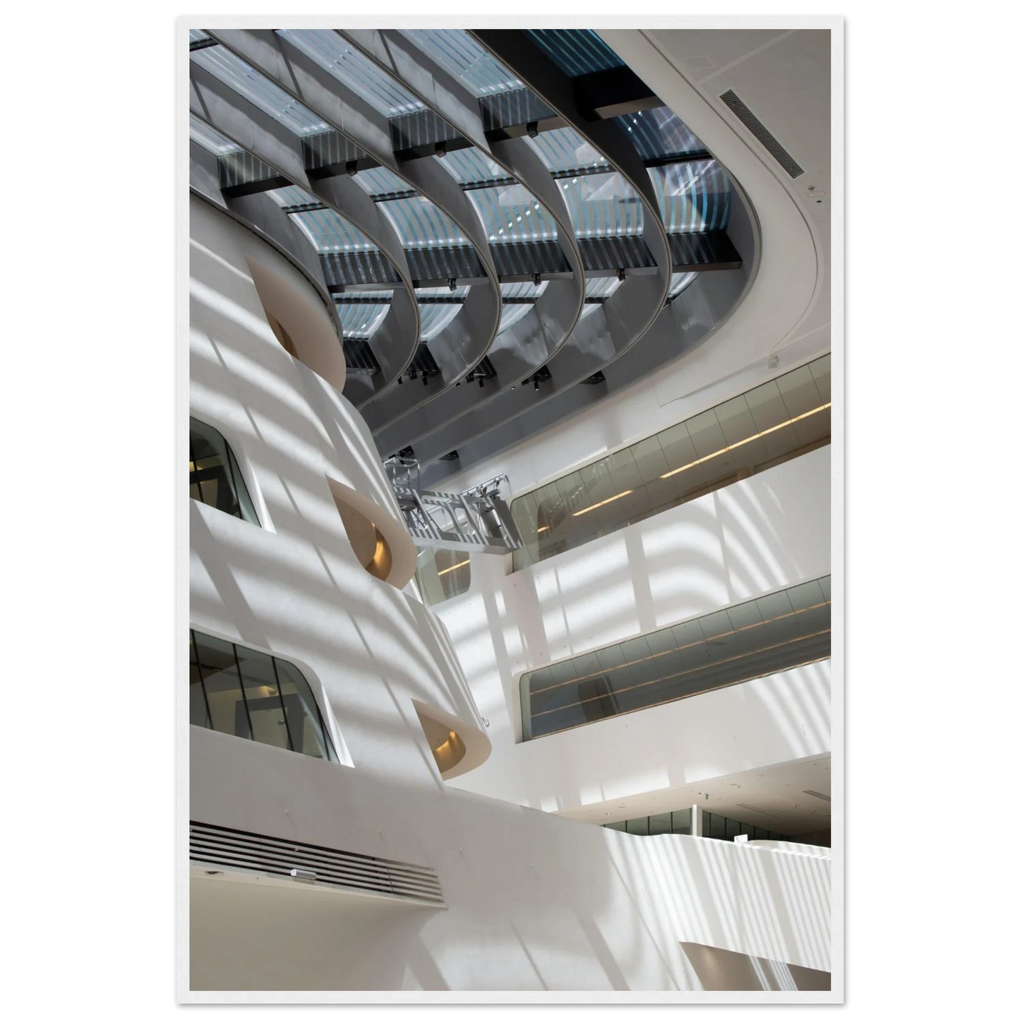 Interior view of the Library of WU (Vienna University of Economics and Business) on wooden frame wall art featuring modern architecture with multiple floors and open study spaces