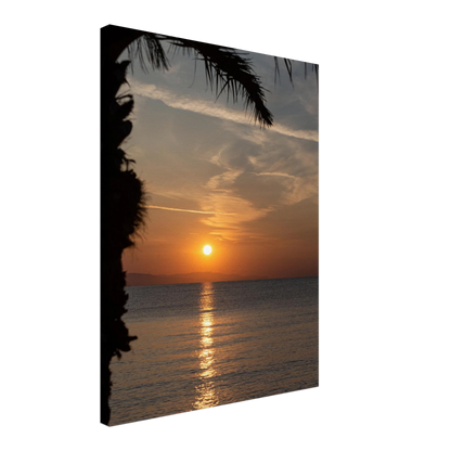 Canvas print wall art, Sunset over calm water with golden reflections, framed by tree branches in a peaceful natural landscape