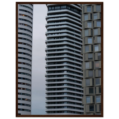 Modern high rise tower buildings with glass and steel facade reaching into the sky on wodden framed wall art