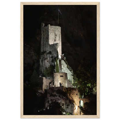 Wooden framed wall art of an ancient stone bastion decorated with green climbing plants against a dark background in Shadow Keep