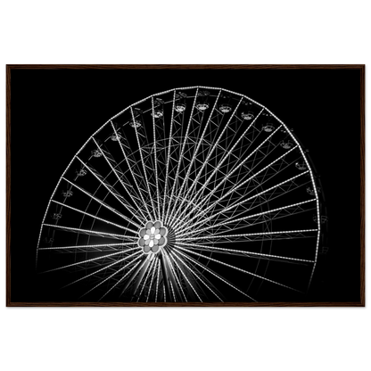 Black and white night photo of the Vienna Prater Giant Ferris Wheel (Wiener Riesenrad) with illuminated spokes forming a circular pattern against the dark sky on wooden framed wall art