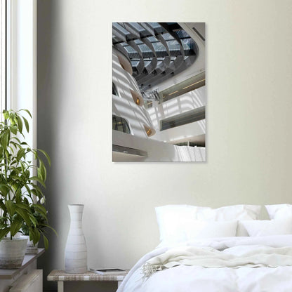 Interior view of the Library of WU (Vienna University of Economics and Business) on Canvas print wall art featuring modern architecture with multiple floors and open study spaces on the wall in the Bedroom