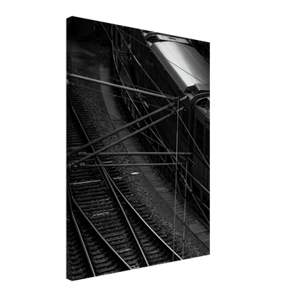 Black and white aerial view of metro train and railway tracks in an urban underground or elevated rail system on Canvas Print wall art on the wall in the Livingroom