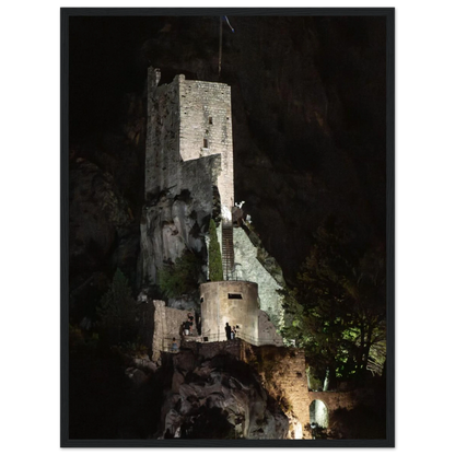 Wooden framed wall art of an ancient stone bastion decorated with green climbing plants against a dark background in Shadow Keep
