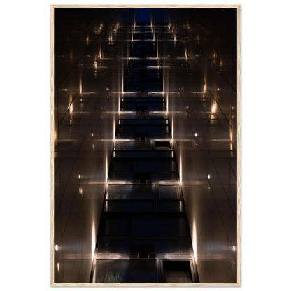 Low angle view looking up a narrow corridor-like passage between two skyscraper walls lined with rows of windows stretching toward the sky on wooden framed wall art