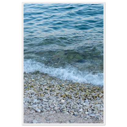 Aerial view ocean beach with wood frame, top down drone shot of blue sea foam and pebbles