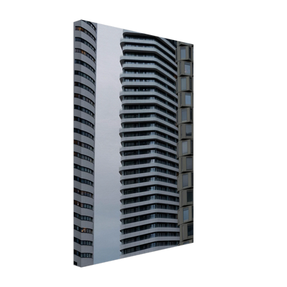 Modern high rise tower buildings with glass and steel facade reaching into the sky on Canvas Print wall art