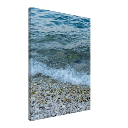 Aerial view ocean beach with wood frame canvas print, top down drone shot of blue sea foam and pebbles