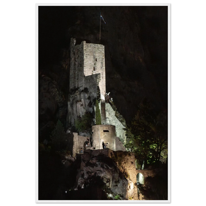 Wooden framed wall art of an ancient stone bastion decorated with green climbing plants against a dark background in Shadow Keep