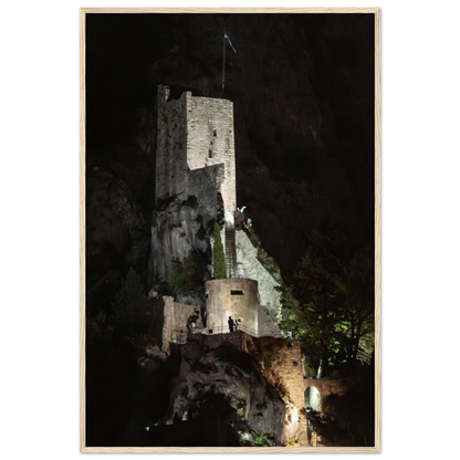 Wooden framed wall art of an ancient stone bastion decorated with green climbing plants against a dark background in Shadow Keep