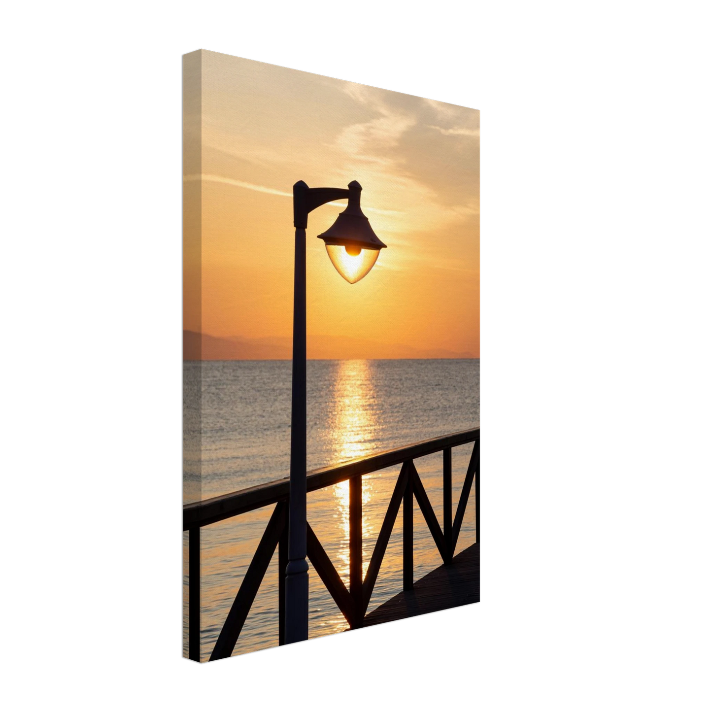 Canvas print wall art of a sunset over the sea with a street lamp on the pier