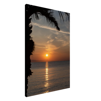 Canvas print wall art, Sunset over calm water with golden reflections, framed by tree branches in a peaceful natural landscape