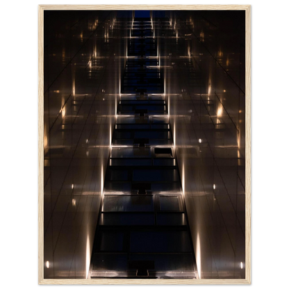 Low angle view looking up a narrow corridor-like passage between two skyscraper walls lined with rows of windows stretching toward the sky on wooden framed wall art