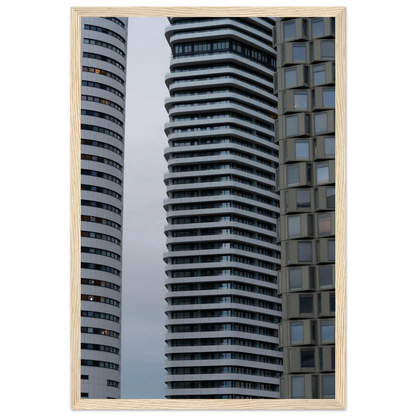 Modern high rise tower buildings with glass and steel facade reaching into the sky on wodden framed wall art