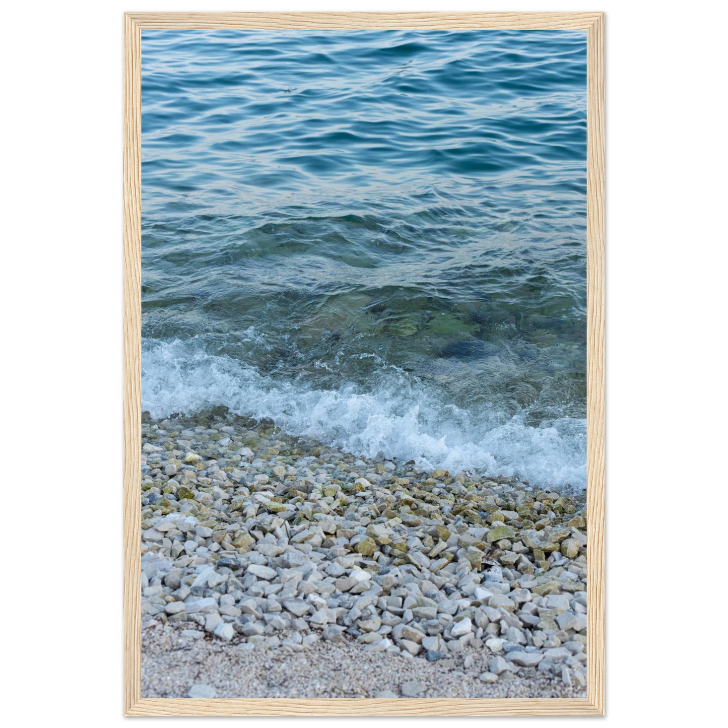 Aerial view ocean beach with wood frame, top down drone shot of blue sea foam and pebbles