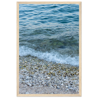 Aerial view ocean beach with wood frame, top down drone shot of blue sea foam and pebbles