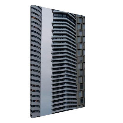 Modern high rise tower buildings with glass and steel facade reaching into the sky on Canvas Print wall art