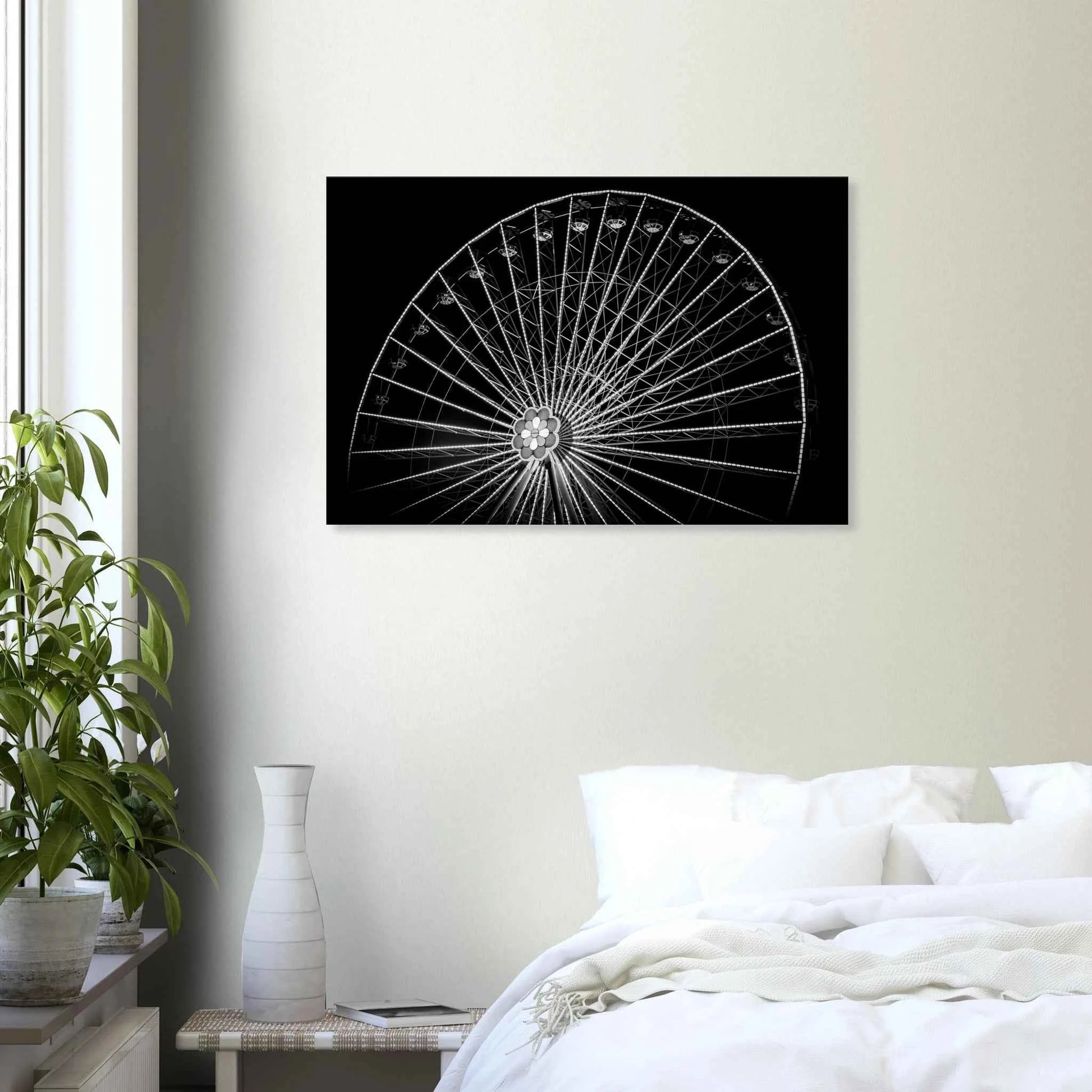 Black and white night photo of the Vienna Prater Giant Ferris Wheel (Wiener Riesenrad) with illuminated spokes forming a circular pattern against the dark sky on Canvas Print wall art on the wall in the Bedroom