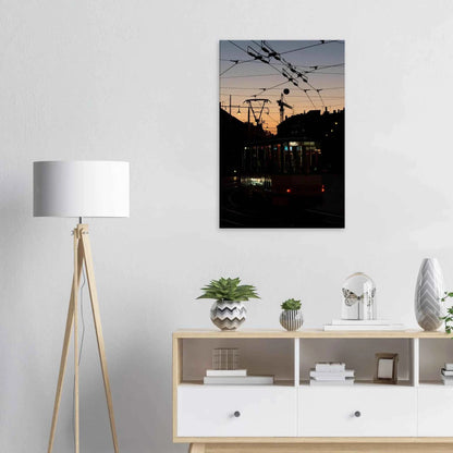 Canvas Print wall art featuring a tram the Nightline driving between houses under power lines during a golden sunset on the wall in the Livingroom