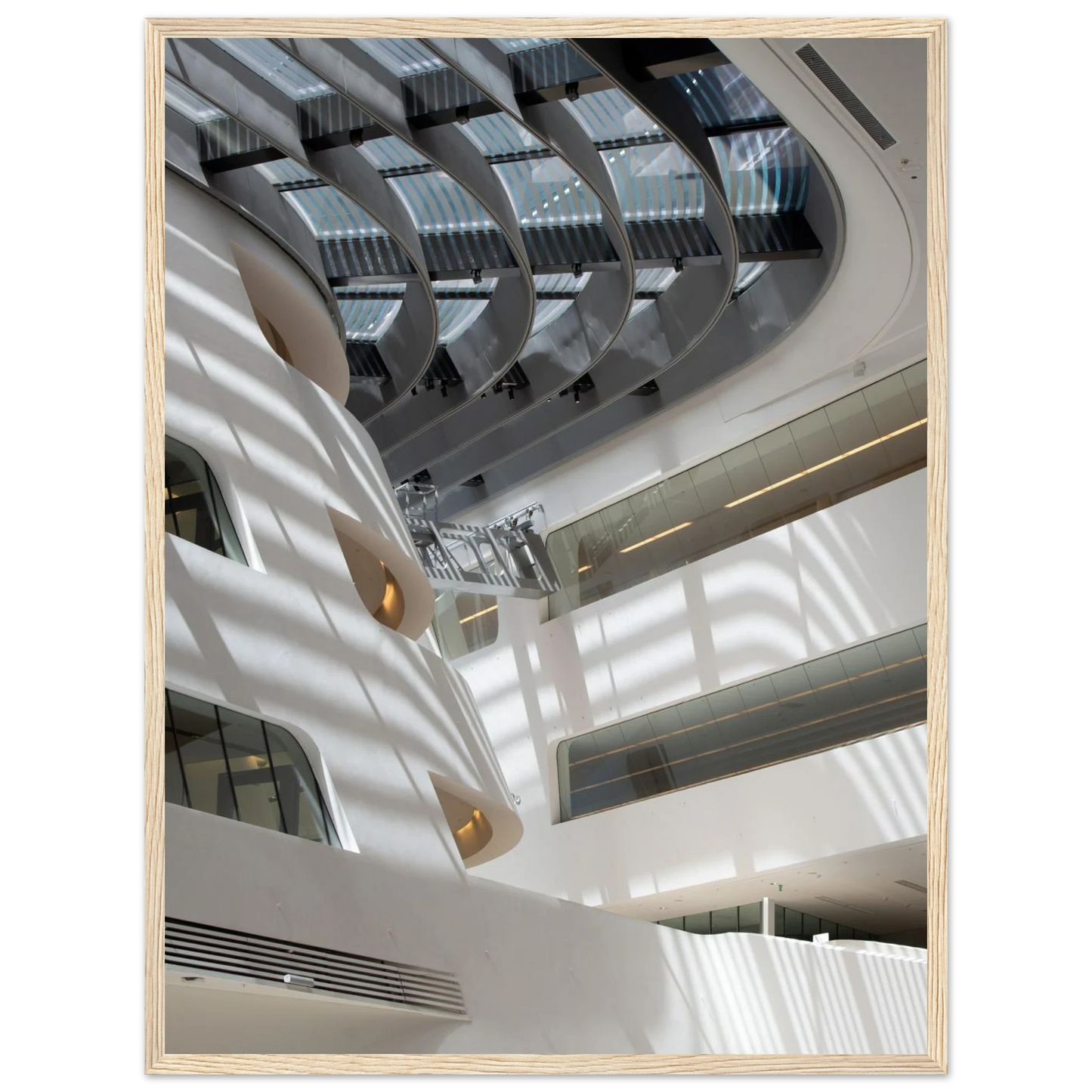 Interior view of the Library of WU (Vienna University of Economics and Business) on wooden frame wall art featuring modern architecture with multiple floors and open study spaces