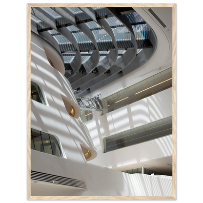 Interior view of the Library of WU (Vienna University of Economics and Business) on wooden frame wall art featuring modern architecture with multiple floors and open study spaces