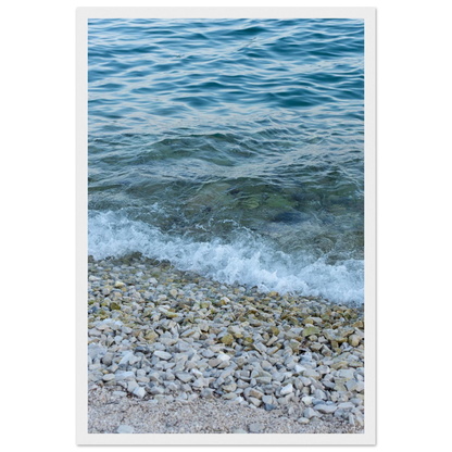 Aerial view ocean beach with wood frame, top down drone shot of blue sea foam and pebbles