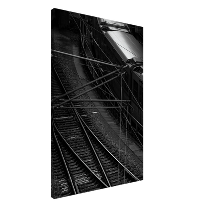 Black and white aerial view of metro train and railway tracks in an urban underground or elevated rail system on Canvas Print wall art on the wall in the Livingroom