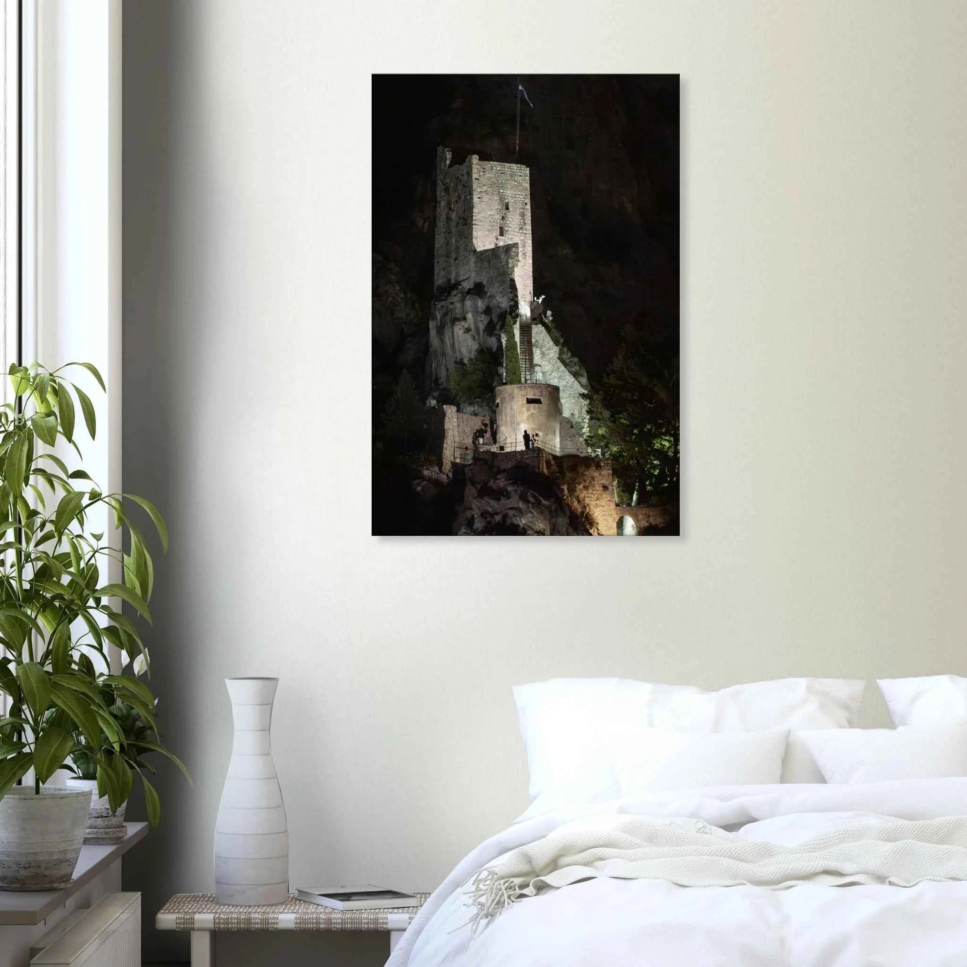 Canvas Print wall art of an ancient stone bastion decorated with green climbing plants against a dark background in Shadow Keep on the wall in the Bedroom