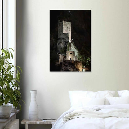 Canvas Print wall art of an ancient stone bastion decorated with green climbing plants against a dark background in Shadow Keep on the wall in the Bedroom