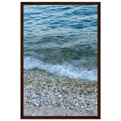 Aerial view ocean beach with wood frame, top down drone shot of blue sea foam and pebbles