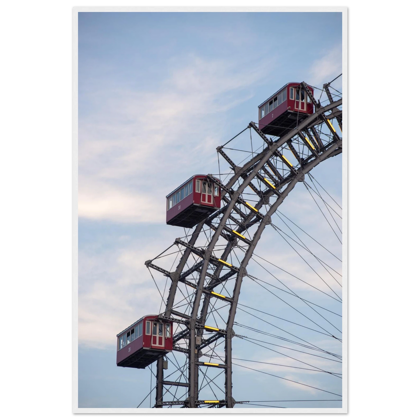 Close up of the historic Vienna Prater Giant Ferris Wheel (Wiener Riesenrad) showing its iconic steel structure and vintage mechanical details on wooden framed wall art