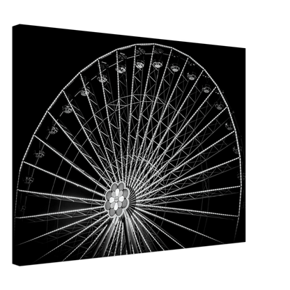 Black and white night photo of the Vienna Prater Giant Ferris Wheel (Wiener Riesenrad) with illuminated spokes forming a circular pattern against the dark sky on Canvas Print wall art