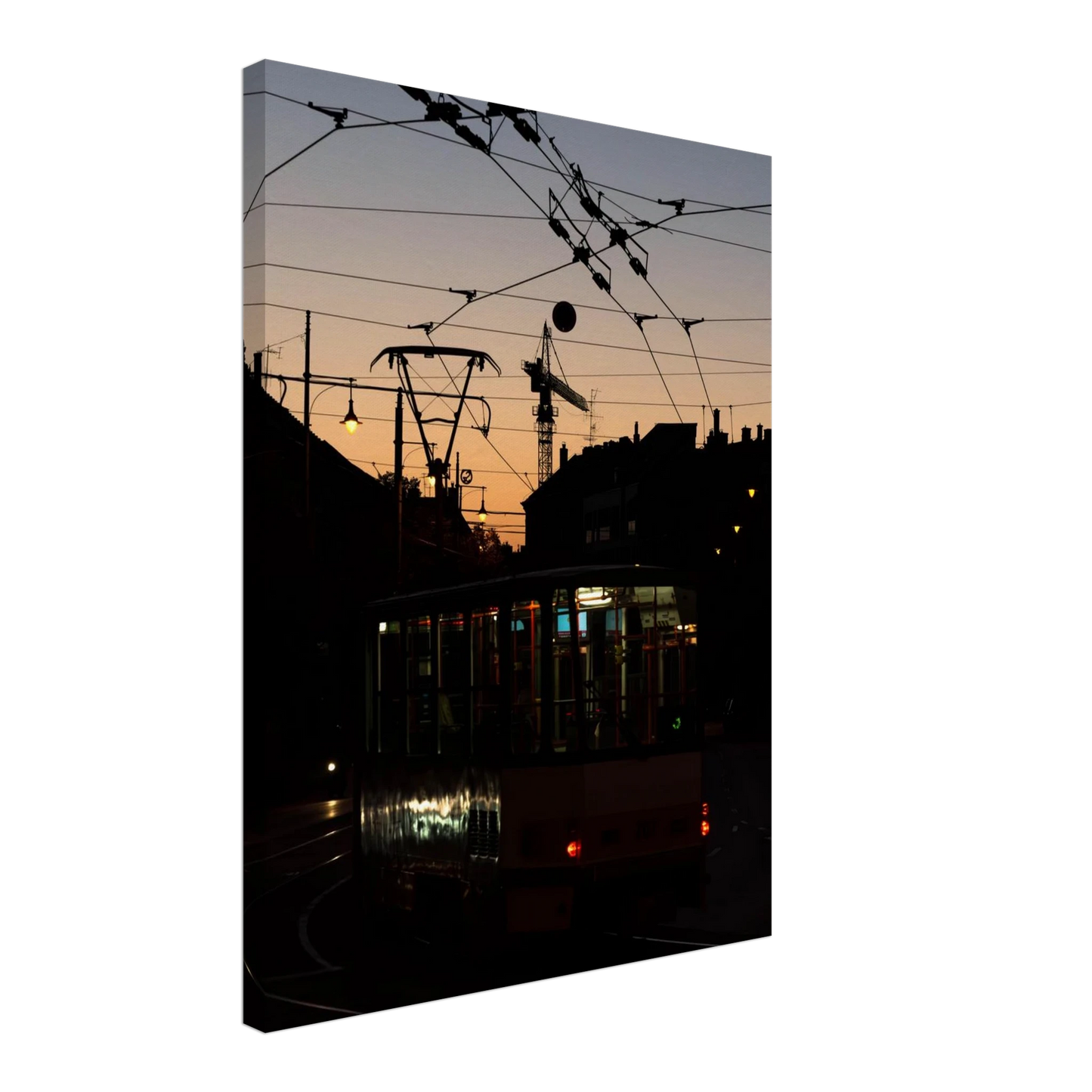 Canvas Print wall art featuring a tram the Nightline driving between houses under power lines during a golden sunset