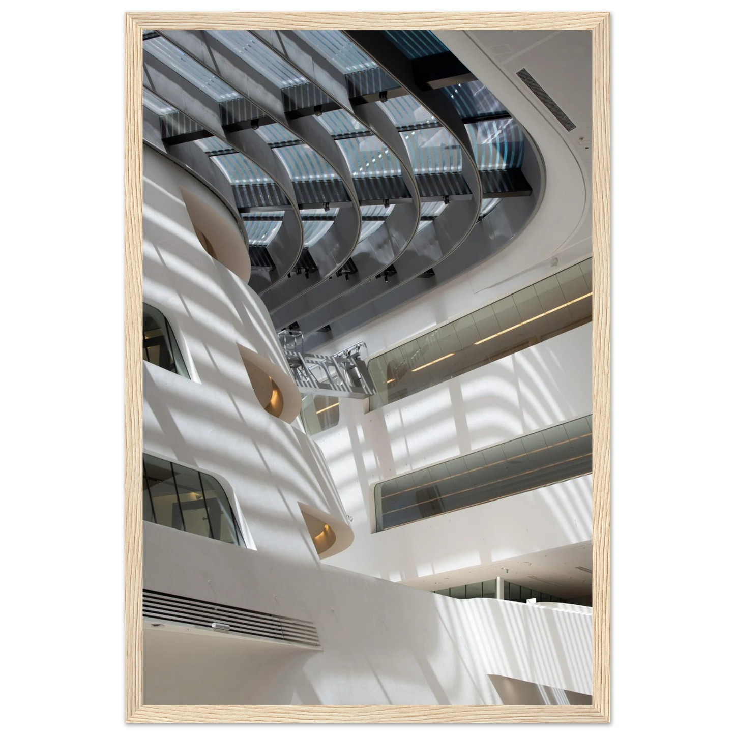 Interior view of the Library of WU (Vienna University of Economics and Business) on wooden frame wall art featuring modern architecture with multiple floors and open study spaces