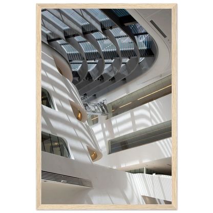 Interior view of the Library of WU (Vienna University of Economics and Business) on wooden frame wall art featuring modern architecture with multiple floors and open study spaces