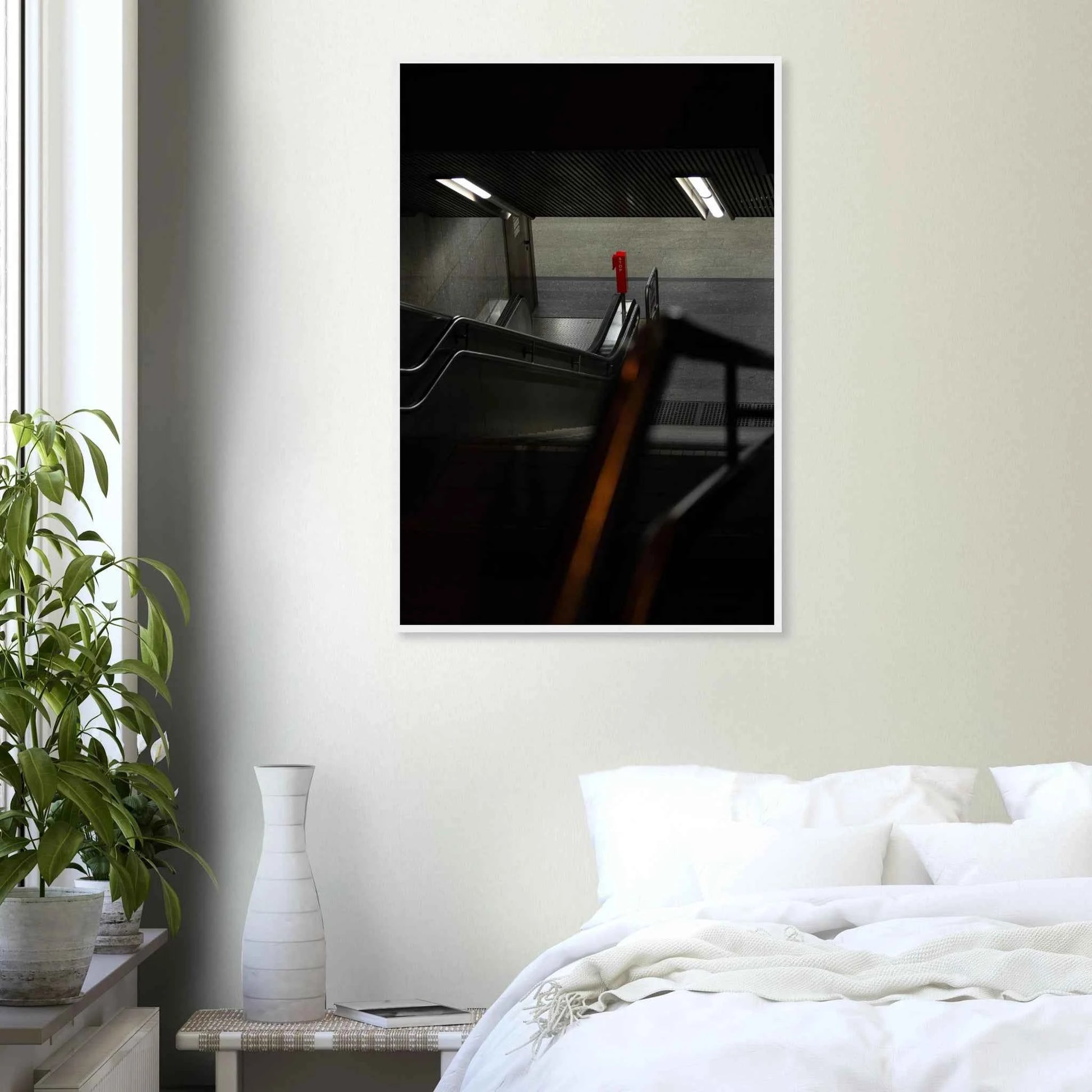 Nighttime view of a metro station entrance with illuminated signs and dark urban surroundings on wooden framed wall art on the wall in the Bedroom