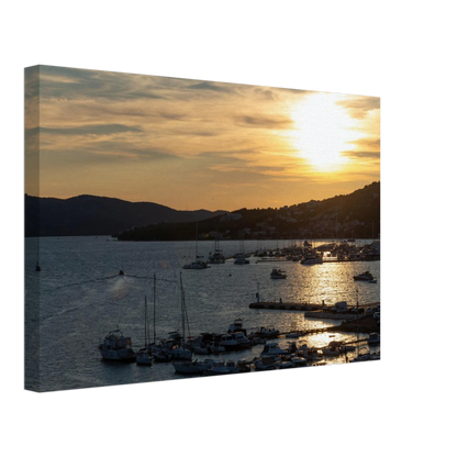 Canvas Print wall art of small boats anchored in a seaside port during Sunset at the harbor