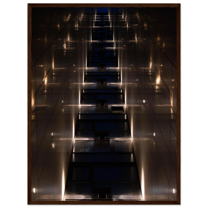 Low angle view looking up a narrow corridor-like passage between two skyscraper walls lined with rows of windows stretching toward the sky on wooden framed wall art