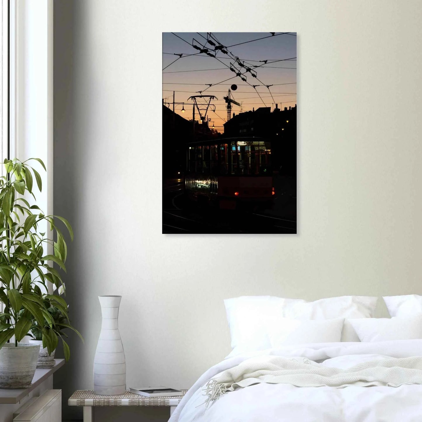 Canvas Print wall art featuring a tram the Nightline driving between houses under power lines during a golden sunset on the wall in the Bedroom