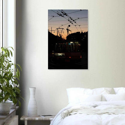 Canvas Print wall art featuring a tram the Nightline driving between houses under power lines during a golden sunset on the wall in the Bedroom
